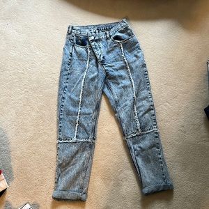 Asymmetrical waist jeans